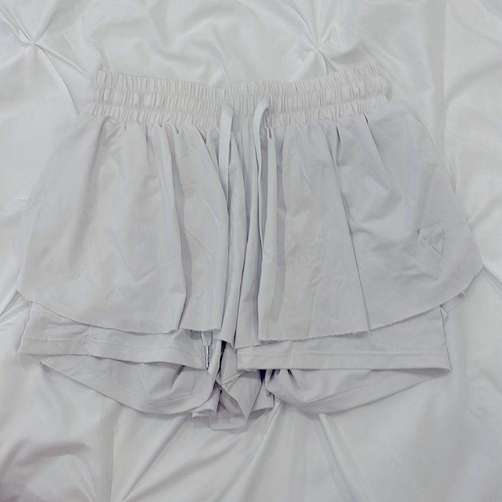Women’s white flowy sport shorts